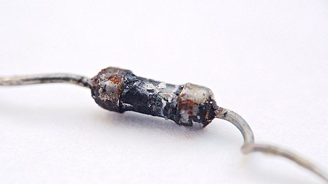 Burnt resistor. Too much power and the smoke gets out.